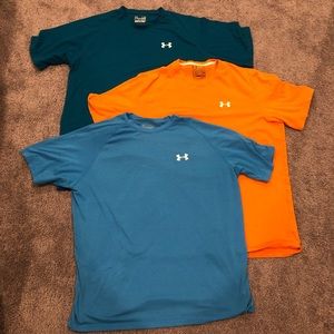 Men’s under armour shirts. Size large.